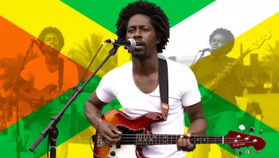 Evolution of reggae with a bass guitarist and Jamaican flag