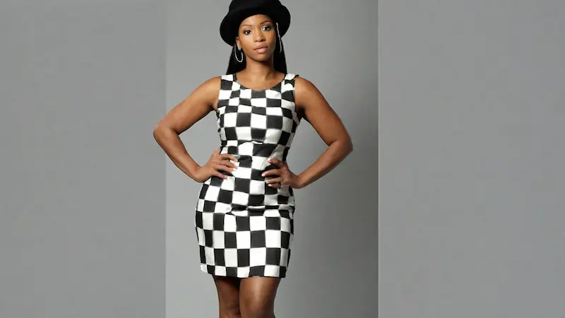 Woman wearing a two tone checkered dress